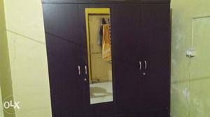 4 door branded almirah with base drawer in very