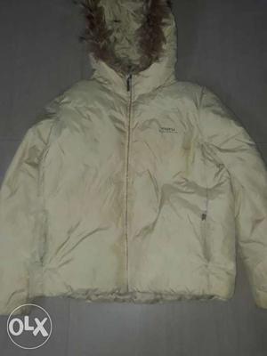 A winter trekking jacket for girls of medium size.