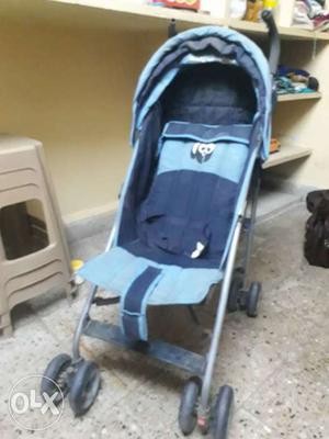 Baby's Blue And Gray Lightweight Stroller
