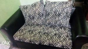 Black And White Fabric Loveseat With Throw Pillows
