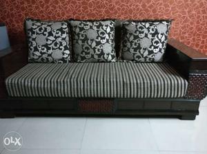 Black And White Fabric Sofa With Throw Pillows