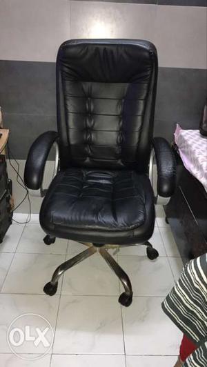 Black Leather Rolling Armchair With Stainless Steel Base