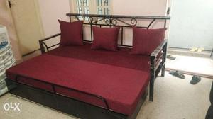 Black Wrought Iron Bed With Red Mattress
