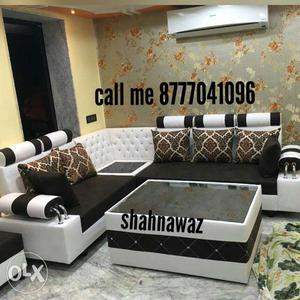 Black and white padded floral sofa set