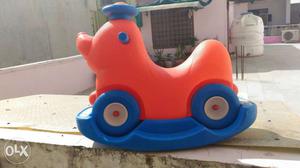 Blue And Orange Ride-on Toy