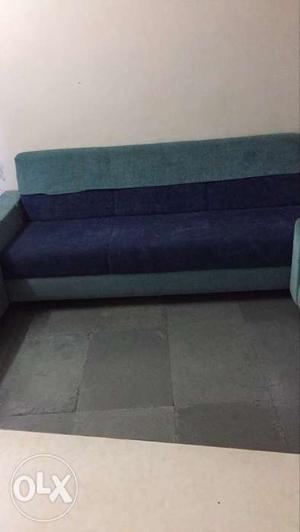Blue sofa with sofa covers