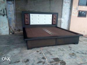 Brown And Black Wooden Bed