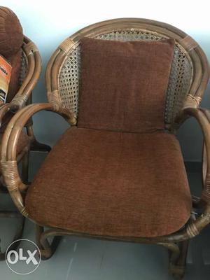 Brown Rattan Framed Padded Armchair