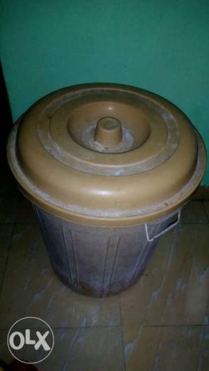 Cylindrical Brown Plastic Pail