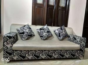 Gray And Black Fabric Sofa With Throw Pillows