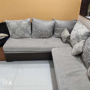 L shape Lounger sofa with pillows. Price