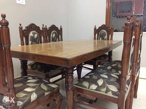 NRI leaving. Selling solid wooden dinning table