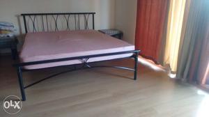 Queen size Metal bed with ply and 6-inch coir + foam branded