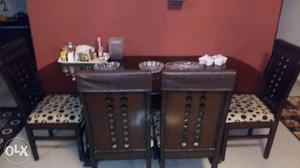 Rectangular Brown Wooden Table With Six Chars Dining Set