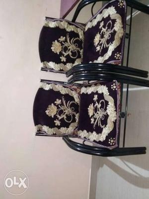 Two Black And Gray Floral Padded Chairs