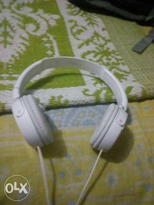 White And Gray Corded Headphones