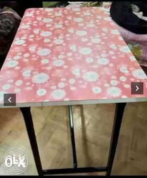 White And Pink Floral Wooden Table