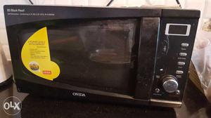 Black And Gray Onida Microwave Oven
