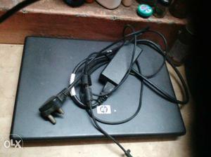 Black HP Laptop With AC Adapter and desktop computer