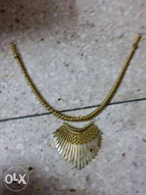 Brand new golden colour contemporary neckless for
