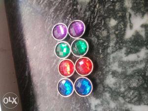 Four Pairs Of Round Silver With Gem Accessories