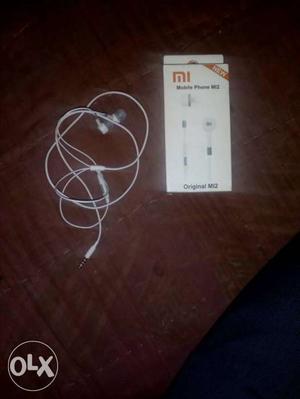 New mi earphone at low price only one day used