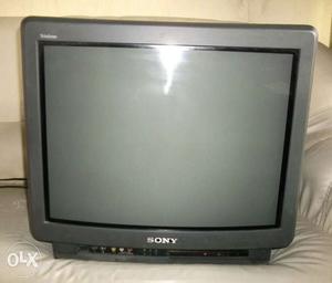 Old Sony Bravia TV with remote.