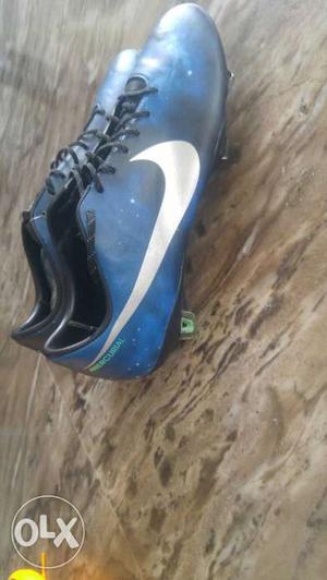 Pair Of Blue-and-white Nike Cleats