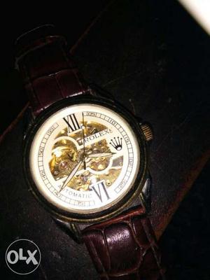 Round Silver Skeleton Watch With Red Leather Strap
