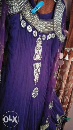 Stunning anarkali suit in a v ball purple colour