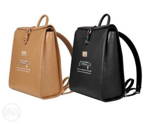 Two Brown And Black Leather Backpacks