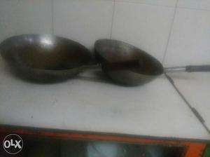 Two Gray Metal Frying Pans