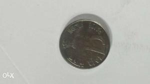 25 Paise coin with Rhino on one side. ()