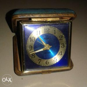 A vintage mechanical box clock by rhythm Japan in