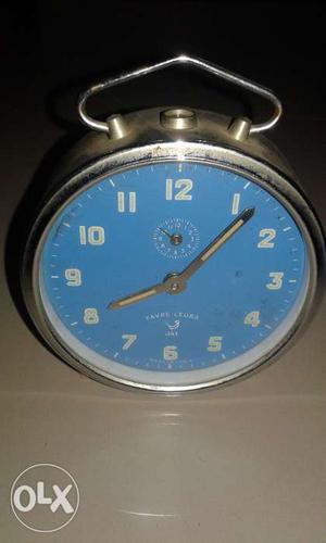 A vintage mechanical clock by Favre lueba in blue