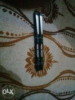 Black and blue teramax pen with full refil