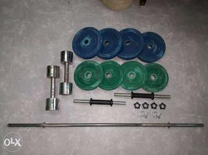 Blue And Green Dumbbell And Barbell Sets
