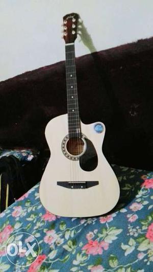 Cutaway White And Black Acoustic Guitar