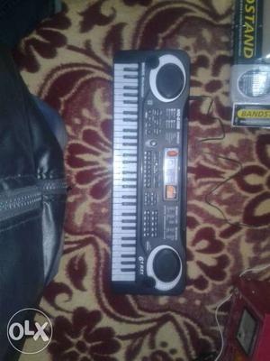 Piano with mic and adopter new fresh