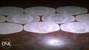 Ten 20 Indian Paise Silver-colored Coins