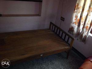 2 wooden cot bed and Dining Table for sale