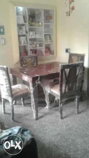 Brand new dining table with 4 chairs for urgent