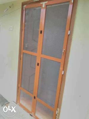 Brown Wood-framed Grey Mesh Door