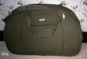 Khakee colour travel bag. Hardly used. Almost in