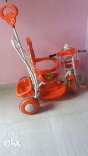 Orange And White Push Trike \