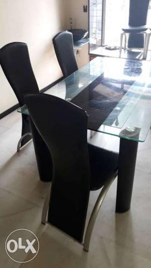 Rectangular Clear Table Top With Four Leather Parsons Chair