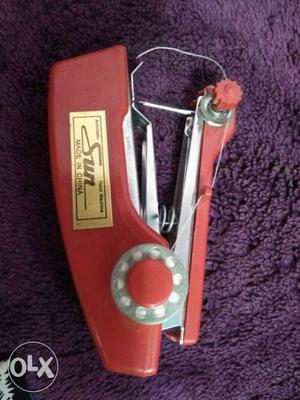 Red And Silver Sun Manual Sewing Machine
