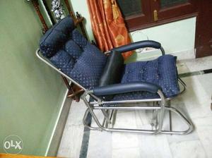 Rocking tv viewing and comfort chair with rocking foot rest