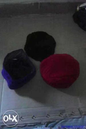 Three Black, Blue, And Red Textiles