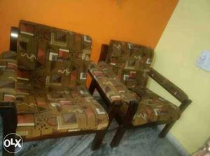 Two Brown Fabric Padded Sofa Chairs